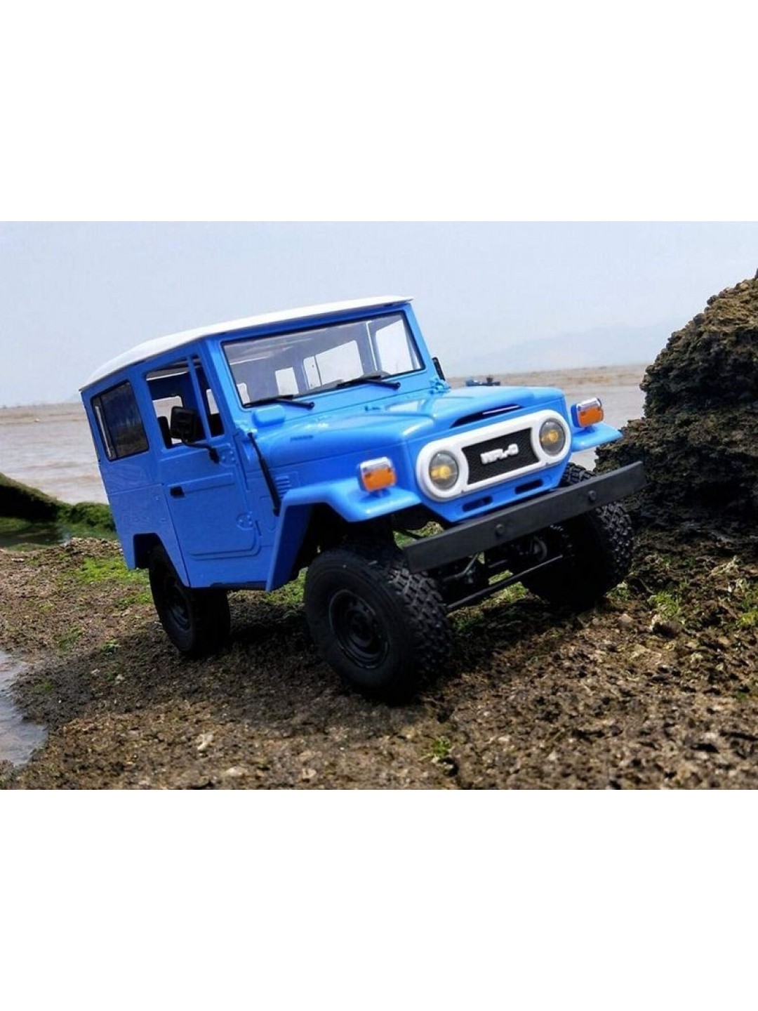 Радиоуправляемая машина WPL японский внедорожник FJ40 (голубая) 4WD 2.4G 1/16 RTR